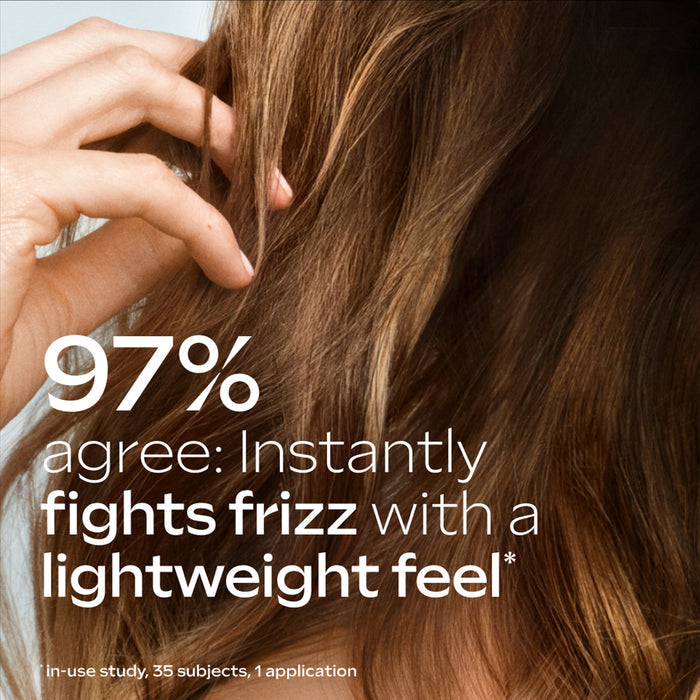 Person with frizzy hair holding it, with text about product effectiveness on a light background