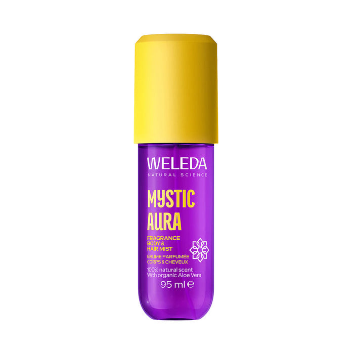A bottle of Weleda Mystic Aura Fragrance Body & Hair Mist, featuring a vibrant purple bottle and a bright yellow cap, set against a plain white background.