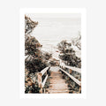 A coastal art print of wooden steps leading down to the beach