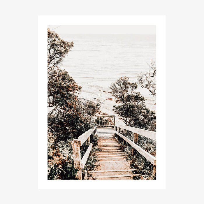 A coastal art print of wooden steps leading down to the beach